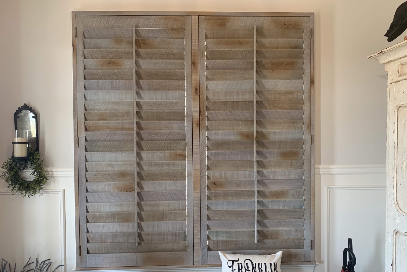 Reclaimed wood shutters in entryway